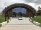 Slough Ice Arena. Accoya - 15mm vertical cladding.  Profiles: 15mm x 42mm, 15mm x 92mm & 15mm x 142mm PAR Eased edges. Colour  Tri-Colour system: Sikkens E5.58.44T Light Oak; Sikkens D5.51.29T Teak (Medium Oak); Sikkens D9.54.32T Dark Oak.