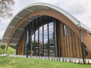 Slough Ice Arena. Accoya - 15mm vertical cladding.  Profiles: 15mm x 42mm, 15mm x 92mm & 15mm x 142mm PAR Eased edges. Colour  Tri-Colour system: Sikkens E5.58.44T Light Oak; Sikkens D5.51.29T Teak (Medium Oak); Sikkens D9.54.32T Dark Oak.