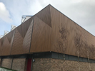 Project: The German School - Richmond. Fire Retardant treated and factory coated Siberian Larch. Grade: Unsorted. Profile: 20f x 120f PAR Eased four edges.